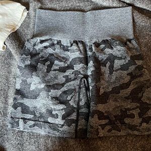 Black and grey camo nvgtn shorts